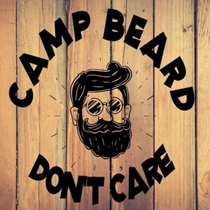 May include: Black and white illustration of a man with a beard and sunglasses on a wood background. The text "Camp Beard Don't Care" is written around the man's head.