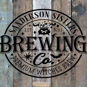 May include: A circular black logo on a wooden background. The logo reads "Sanderson Sisters Brewing Co. Premium Witches Brew" with a cauldron, spider, and bat illustrations. The text "Est 1693" is also included.