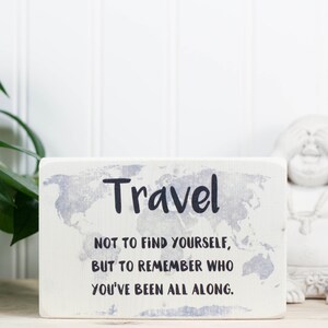 Small whitewashed wood travel sign with faded map, Gift for adventurer or traveler, "Travel not to find yourself, but to remember who..."
