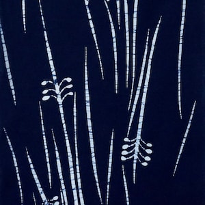 May include: A dark blue fabric with a white pattern of tall, thin stalks and small, round buds. The pattern is repeated throughout the fabric.