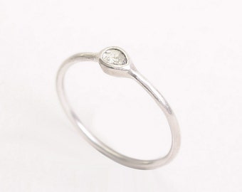 Irregular uncut diamond 925 silver ring with different finishing.