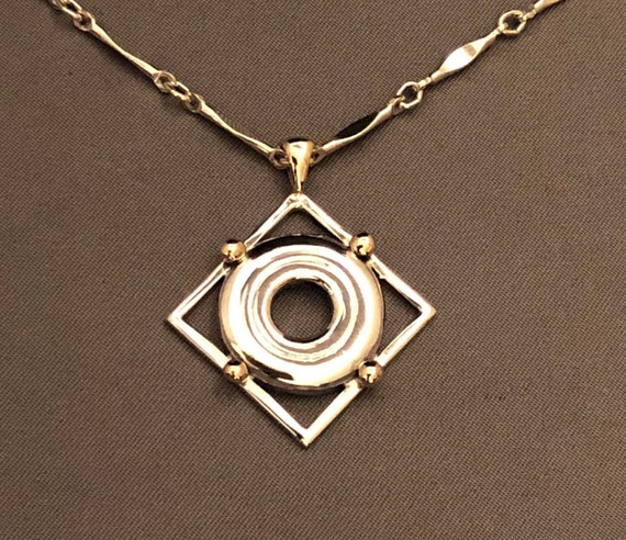 14K Gold Accented Sterling Silver Open Hole Flute Key in Frame Pendant
