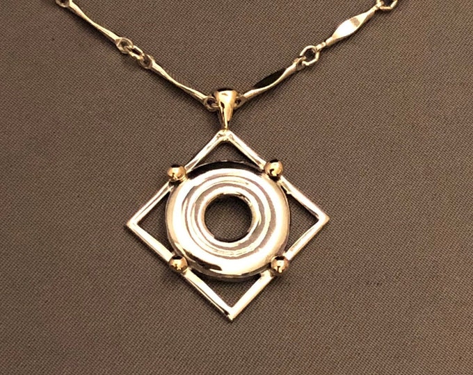 Solid Sterling Silver Open Hole Flute Key in 14K Gold Accented Frame Pendant