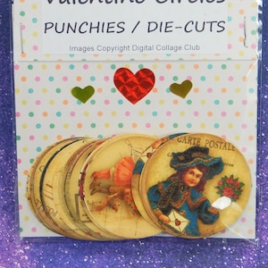 May include: A package of 30 Victorian Valentine Circles punchies or die-cuts. The package is clear plastic and shows the circles stacked on top of each other. The circles are printed with vintage images of children and flowers. The package also has a red, gold, and green heart on the front.