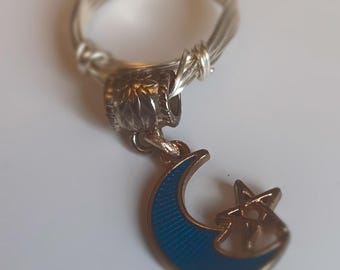 Silver Ring Band and Blue Half Moon Charm Ring With Star Attached.