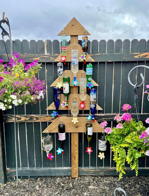 Recycle your own bottle into a hummingbird feeder with a NectarGUARD "Twiggy" DIY Kit.The proprietary valve in the flower keeps nectar fresh