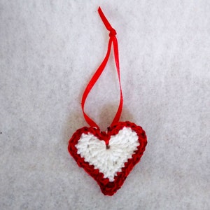 White crochet valentine heart trimmed with red sparkly sequin trim and a satin ribbon. Sweet little holiday gift idea for someone you love. image 8