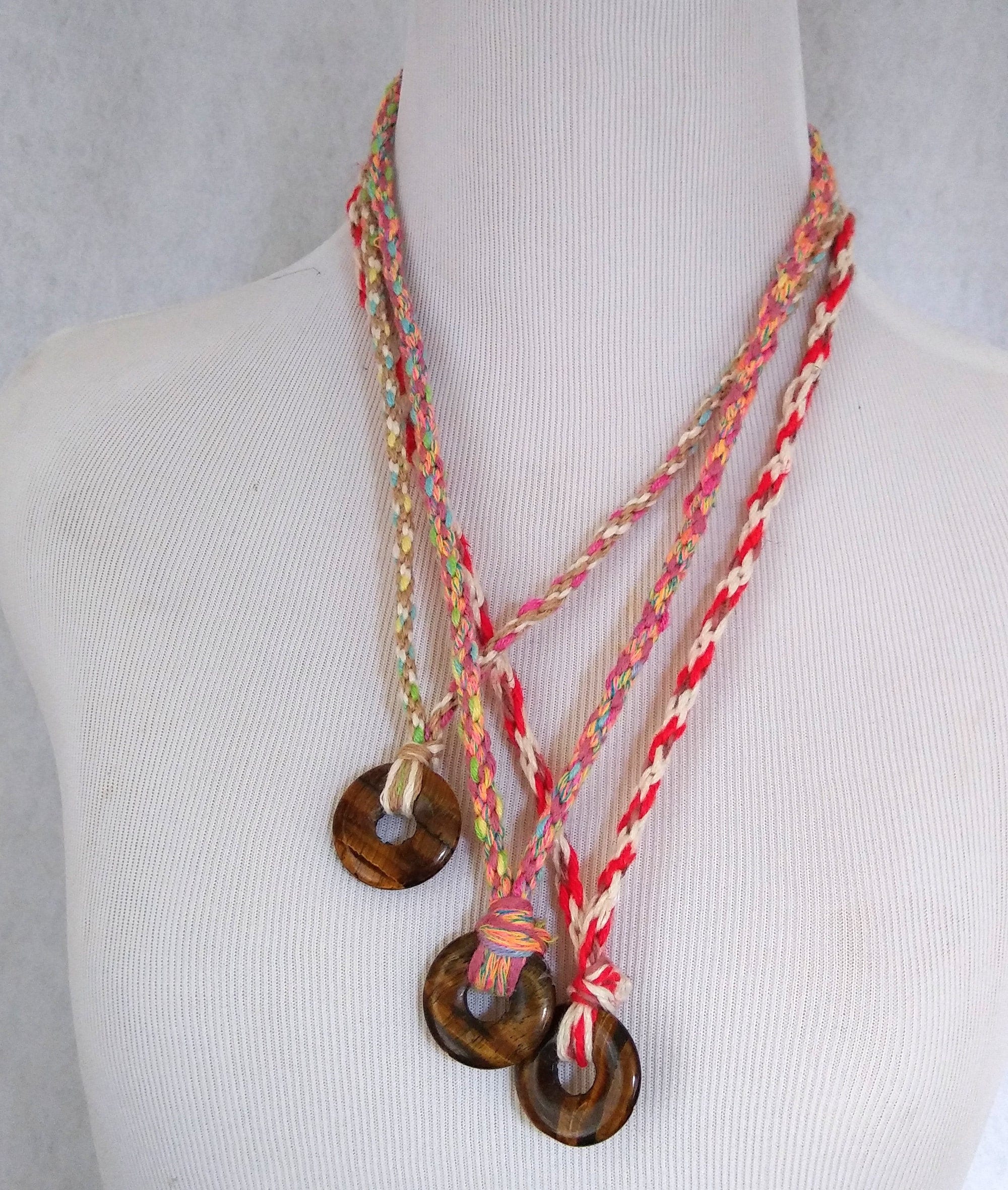 Hand braided cord necklace with round tiger eye pendant