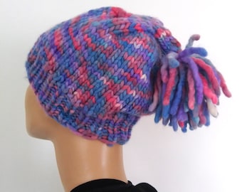 handknit beanie with tassle, playful outdoor winter hat in purple blue pink, in stock and ready to ship