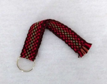 Brown red orange green cotton strap with attached ring