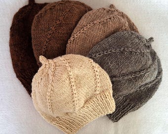 Hand-knit all natural alpaca beanie with a diamond border design,