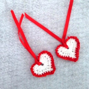 Pair 2 of red and white hearts hand-crocheted with sparkly White