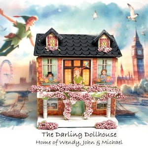May include: A miniature dollhouse with a black roof, brick facade, and floral accents. The house features illustrations of Peter Pan characters and the text "The Darling Dollhouse Home of Wendy, John & Michael."