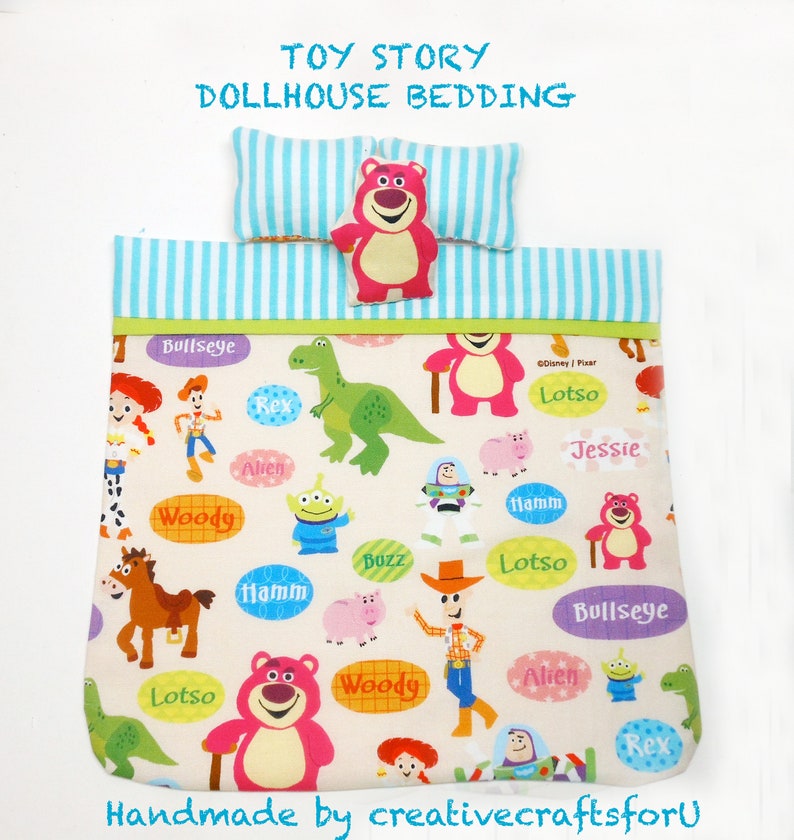 May include: Toy Story dollhouse bedding set with a white background and colorful characters from the movie. The bedding features characters like Woody, Buzz Lightyear, Jessie, and Lotso. The bedding is handmade and includes a pillow with blue and white stripes.