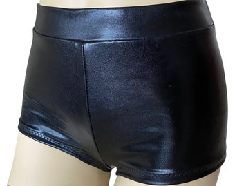 May include: Black faux leather shorts with a high waist and a shiny finish.