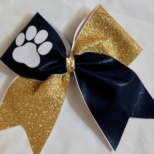 Cheer bow-navy, gold and white paw print