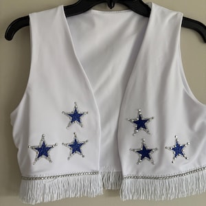 Chaleco blanco únicamente con estrellas plateadas y azules