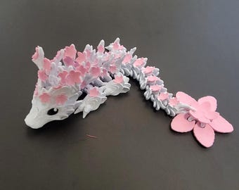 Cinderwing Drago articolato stampato in 3D: giocattolo antistress a forma di fiore di ciliegio bianco