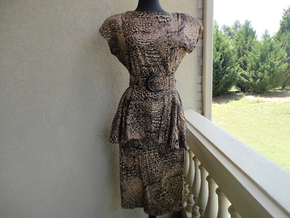 Joni Blair Peplum Dress