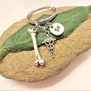 ORTHO MD, ortho TECH or nurse keychain personalized with initial charm - 3D femur bone & caduceus keyring, purse charm, zipper pull