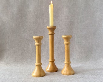 Set of three lightweight wooden candlestick holders, trio of Scandinavian style minimalist tapered candle holders