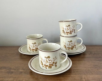 Set of four vintage Royal Doulton tea/coffee cups and saucers, 1970s English speckled floral pattern teacups and saucers set