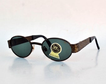 Gafas de sol ovaladas vintage con protección UV, montura de carey marrón, lentes de diseño de los años 90, gafas retro