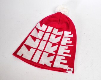 red nike skull cap