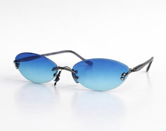 Y2K Rimless Sunglasses – Blue Tinted Oval Lenses – Retro 2000s Slim Frame – Vintage Style Shades