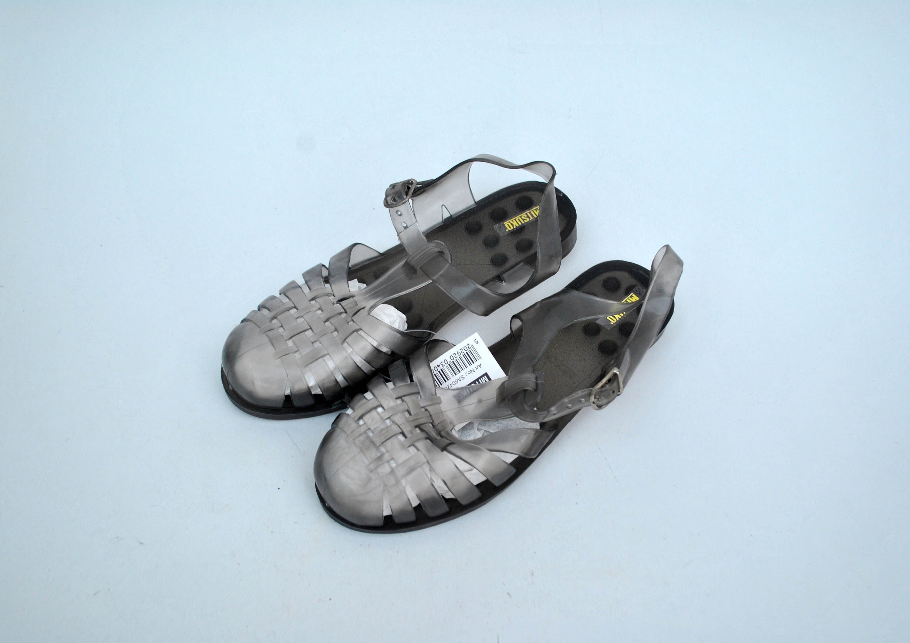White plastic hotsell sandals