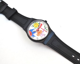 Kleurrijk pop-artpolshorloge – nieuw quartzhorloge met grafische wijzerplaat en zwarte rubberen band – uniseks statementhorloge