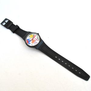 Reloj de pulsera colorido con diseño pop art: reloj de cuarzo con esfera gráfica y correa de caucho negra. Reloj unisex con estilo. imagen 2