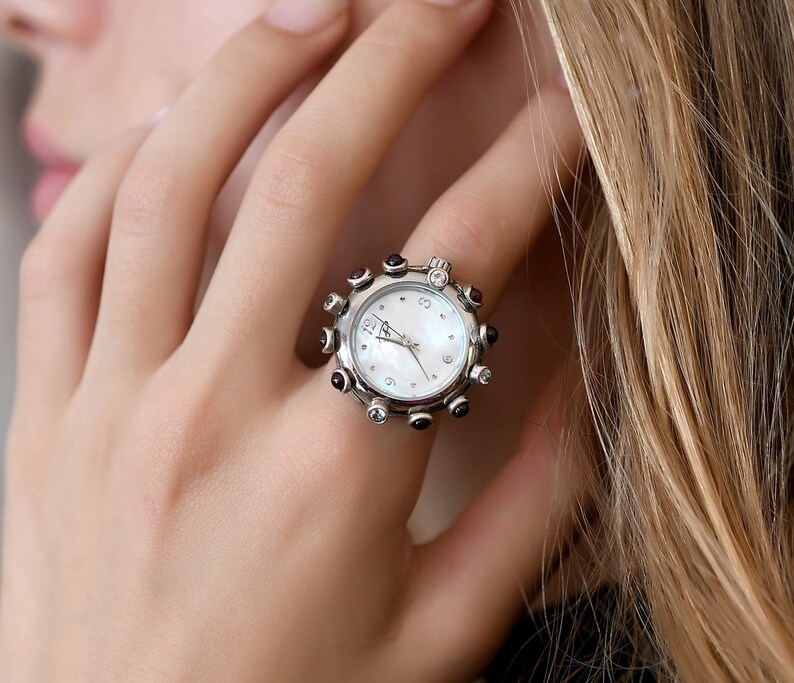 Montre bague en argent vintage pour