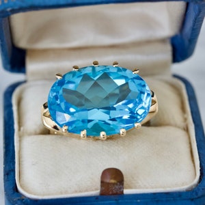 Bold 1990s Blue Topaz Cocktail Ring in 14k Yellow Gold, Size 6, Vintage Statement Rings, December Birthstone Jewelry, Oval Cut Gemstones image 1