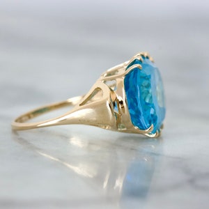Bold 1990s Blue Topaz Cocktail Ring in 14k Yellow Gold, Size 6, Vintage Statement Rings, December Birthstone Jewelry, Oval Cut Gemstones image 6