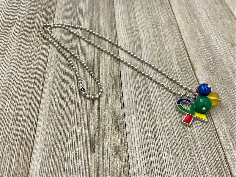 Autism Charm Necklace,autism ribbon necklace,autism jewelry,autism awareness jewelry,autism awareness ribbon,autism ribbon charm,autism