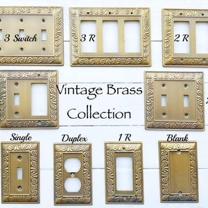 May include: A collection of brass wall plates with a decorative scroll border, labeled as Vintage Brass Collection. The set includes various configurations for switches, rockers, duplex outlets, and blank covers with screw holes for installation.