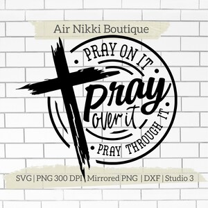 May include: Black and white graphic design with a cross and a circle. The text inside the circle reads "Pray on it. Pray over it. Pray through it."
