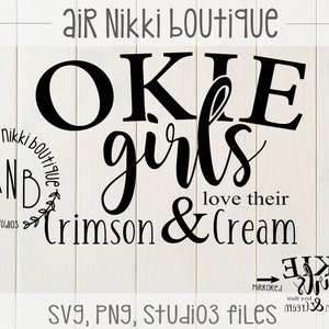 May include: Black and white graphic design with the text "OKLE girls love their crimson & cream" and a mirrored version of the text. The design also includes a circle with the text "Air Nikki Boutique" and the letters "ANB" inside the circle.