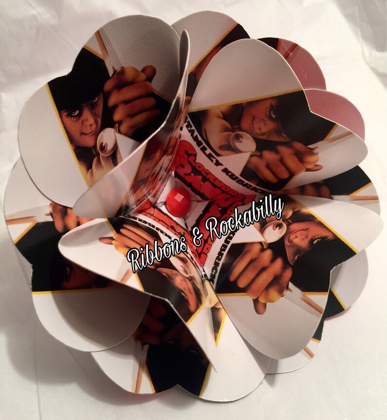 A Clockwork Orange playing card blossom hair accessory with orange gem embellishment image 1