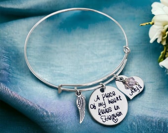 A piece of my heart lives in Heaven personalized bracelet bangle bracelet birthstone name Monogrammed jewelry angel wing remembrance gift