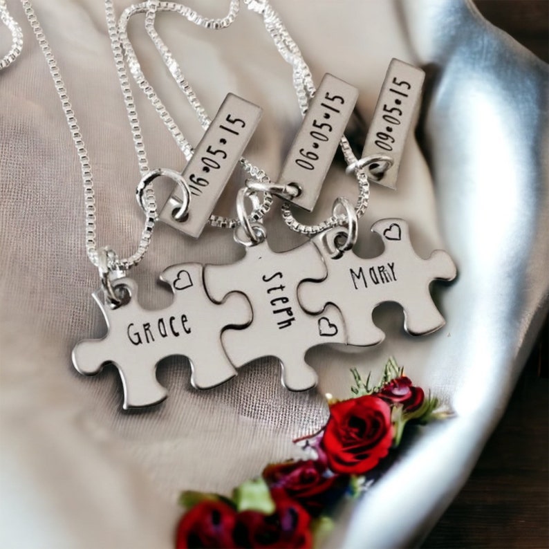 Set of personalized puzzle piece necklaces with names and date image 1