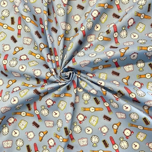 May include: A blue fabric with a repeating pattern of various clocks and watches. The clocks are in different styles and colours, including red, yellow, and black.