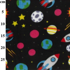 May include: Black fleece fabric with a repeating pattern of colourful planets, stars, and rockets. The fabric is ideal for crafting projects such as blankets, pillows, and clothing.