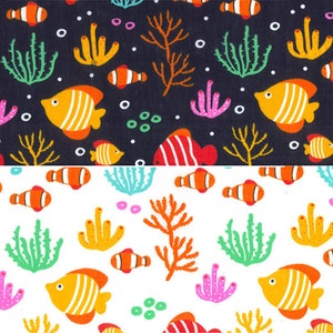 May include: A seamless pattern featuring orange, red, and green fish swimming among coral and seaweed on a black and white background. The pattern is perfect for fabric, wallpaper, or wrapping paper.