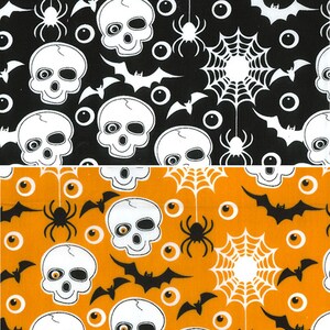May include: Black and orange fabric with a Halloween pattern. The pattern includes skulls, bats, spiderwebs, and eyeballs.