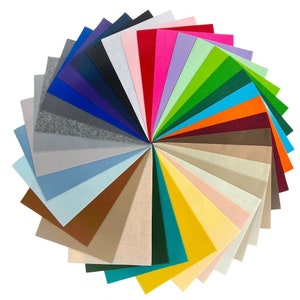 May include: A fan of 30 different colours of felt fabric. The felt is arranged in a circle with the colours radiating out from the centre.