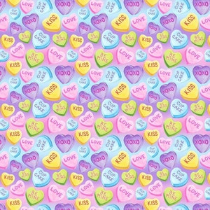 May include: A seamless pattern of colorful heart-shaped candies with various Valentine's Day messages, including "Love", "Kiss", "Cupcake", "Be Mine", "XOXO". The candies are on a light purple background.