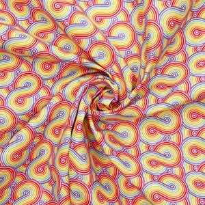 May include: A fabric with a repeating pattern of rainbow-colored swirls. The swirls are made up of red, orange, yellow, green, blue, indigo, and violet stripes. The fabric is white with a subtle shimmer.