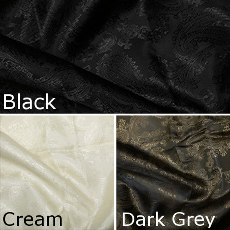 Pode incluir: Tr&ecirc;s amostras de tecido em preto, creme e cinza escuro. Cada amostra apresenta um padr&atilde;o paisley.